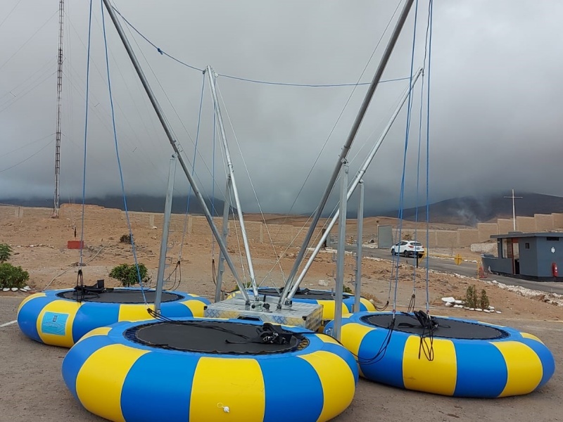Inflatable bungee trampoline with trailer